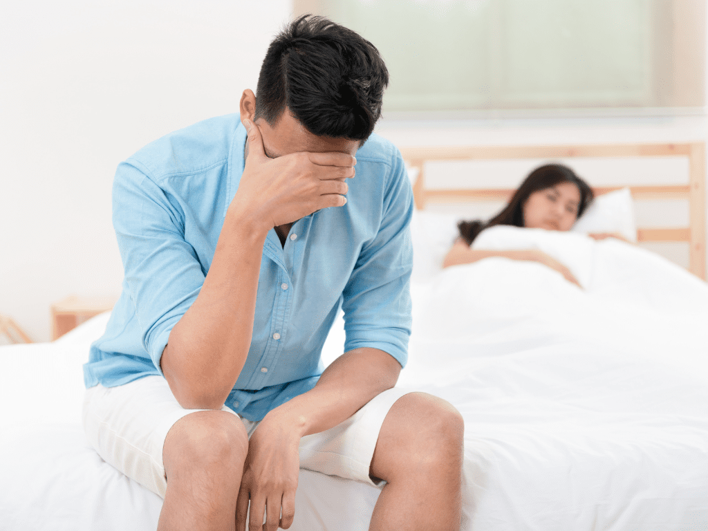 A healthcare provider discussing erectile dysfunction treatment options with a patient at Denton Family Practice Clinic.